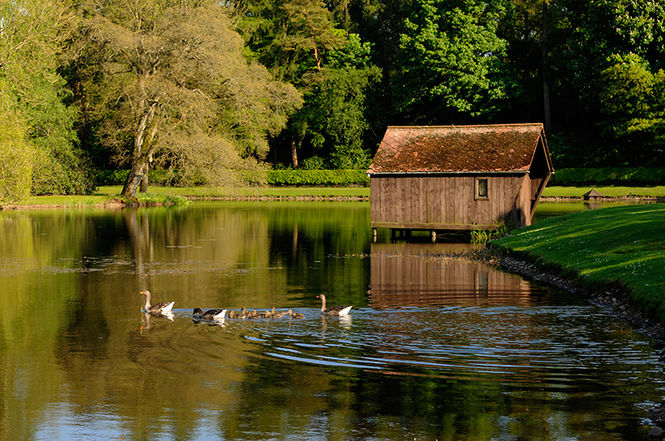 The boat house on the man-made loch at Dalswinton House
